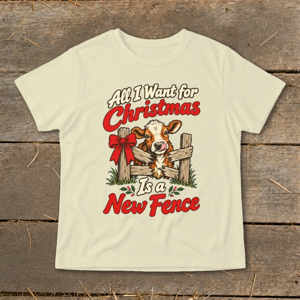 Cow peeking over fence with text "All I Want for Christmas Is a New Fence".