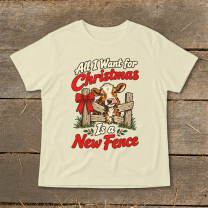 Cow peeking over fence with text "All I Want for Christmas Is a New Fence".