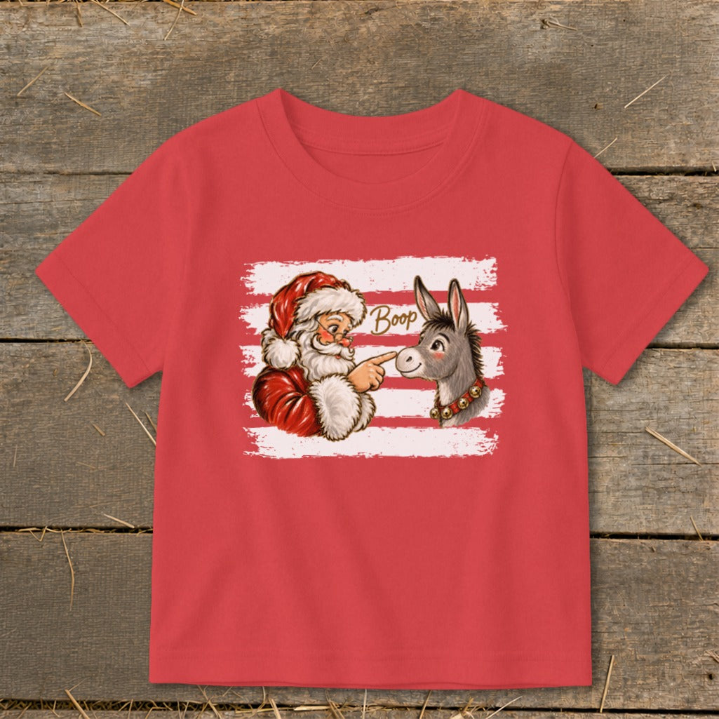 Santa Claus booping a donkey with the word "Boop" on a red shirt.