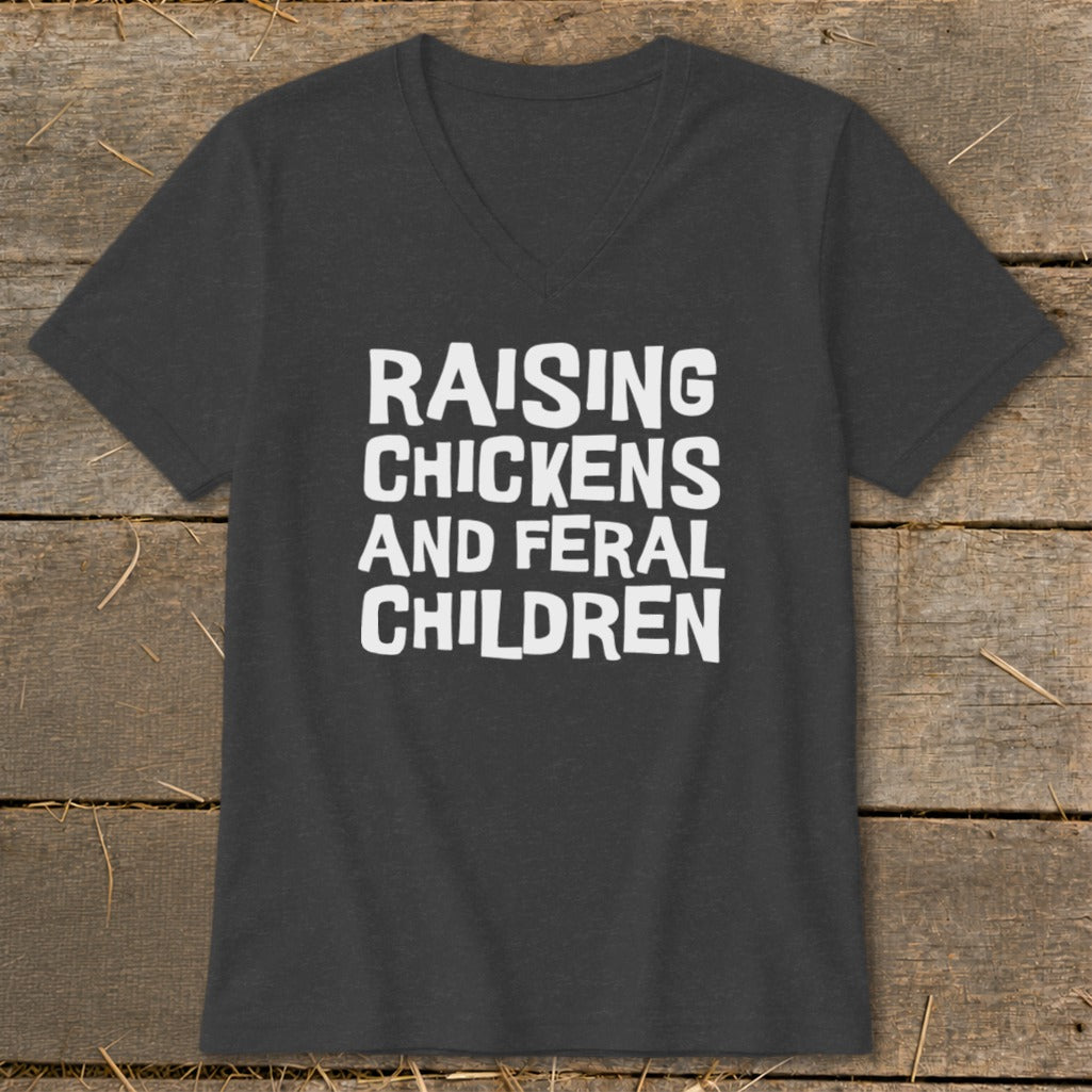 Dark grey t-shirt with white text reading "Raising Chickens And Feral Children".