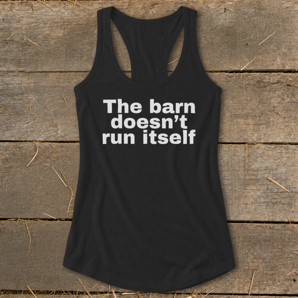 Black racerback tank top with white text: "The barn doesn't run itself."