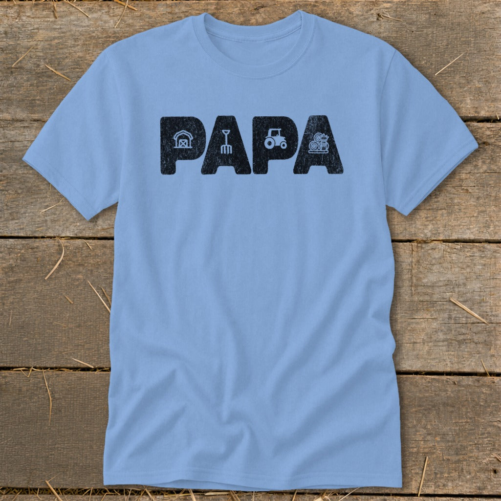 Light blue t-shirt with black "PAPA" text and farm-themed icons.