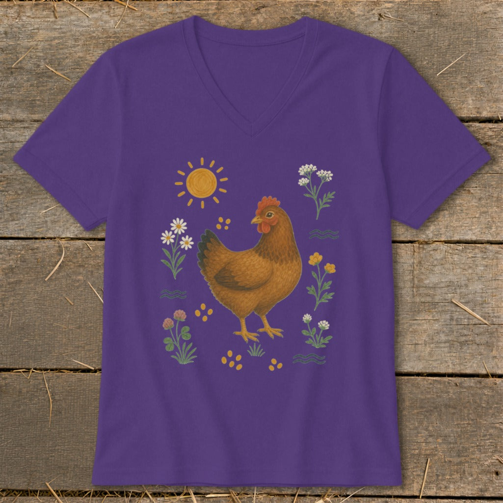 Purple t-shirt with a chicken and flowers graphic.