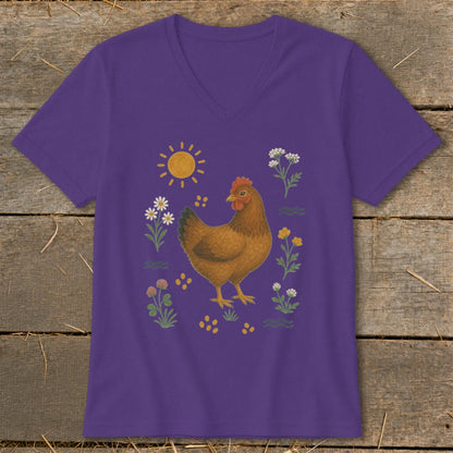 Purple t-shirt with a chicken and flowers graphic.