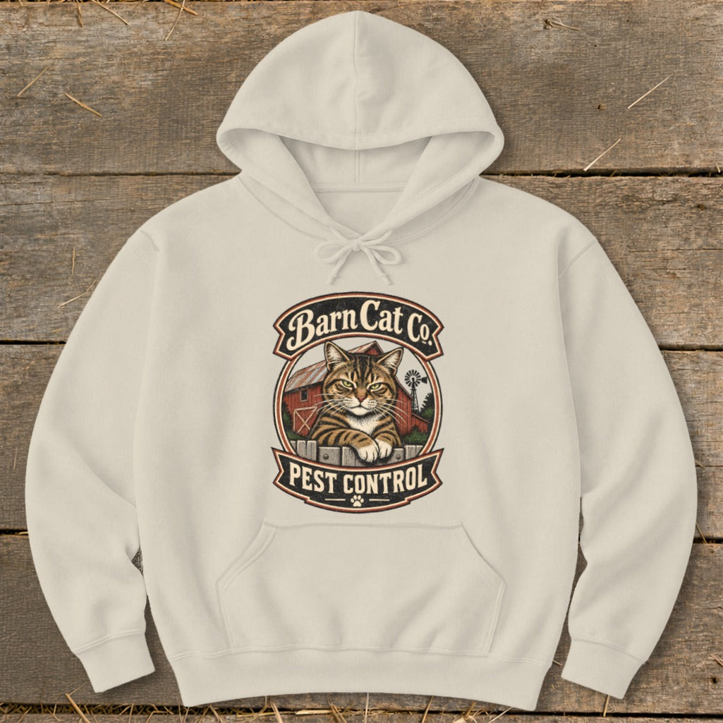 Cream-colored hooded sweatshirt featuring a vintage-style graphic of a tabby cat and Barn Cat Co. Pest Control text.