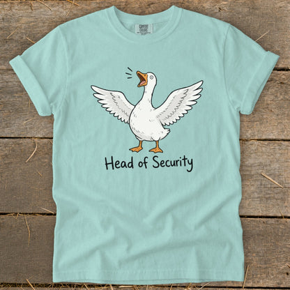Light blue t-shirt with cartoon goose and text "Head of Security".
