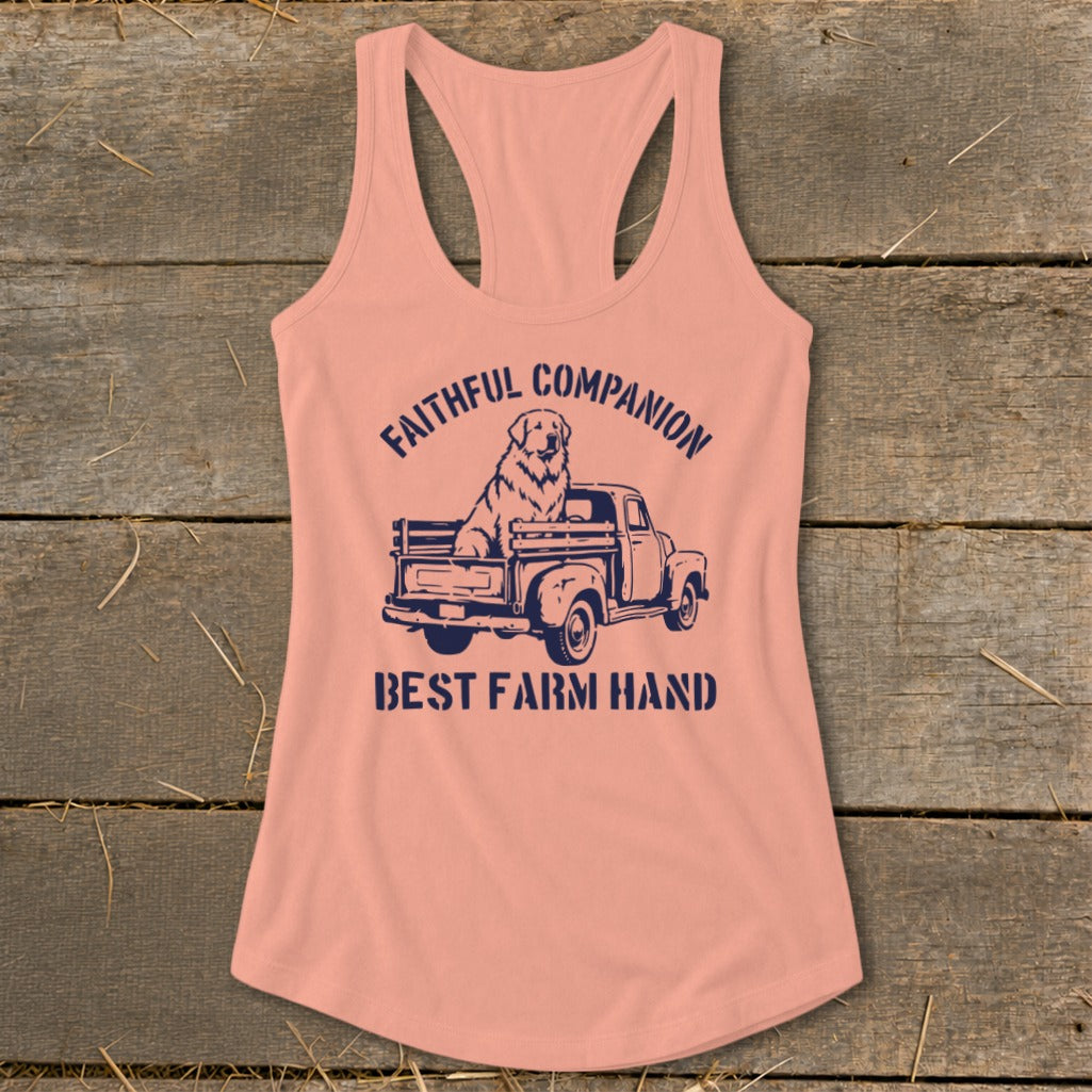 Peach tank top with a navy graphic of a dog in a truck and text.