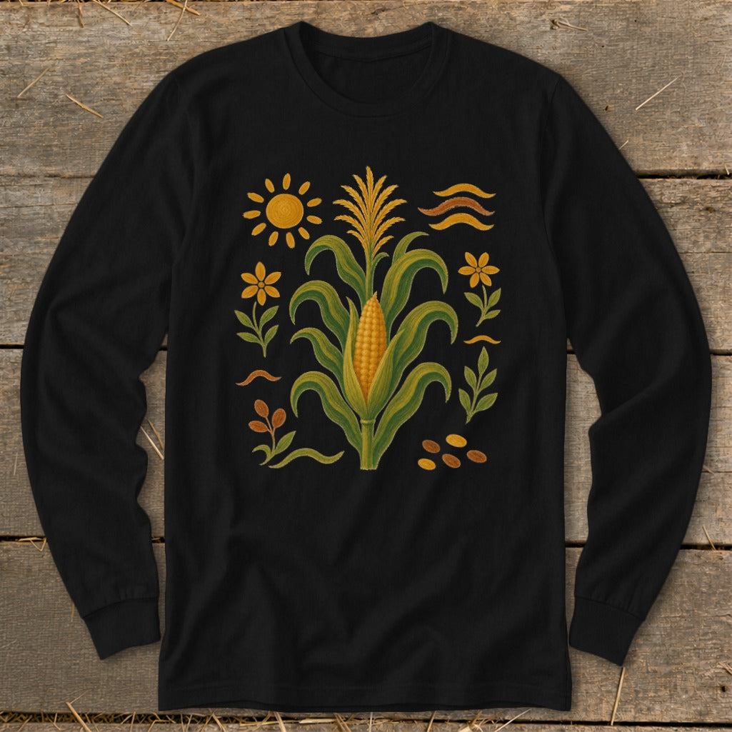 Black long-sleeve shirt with a colorful corn stalk and folk art sun, flowers, and waves.