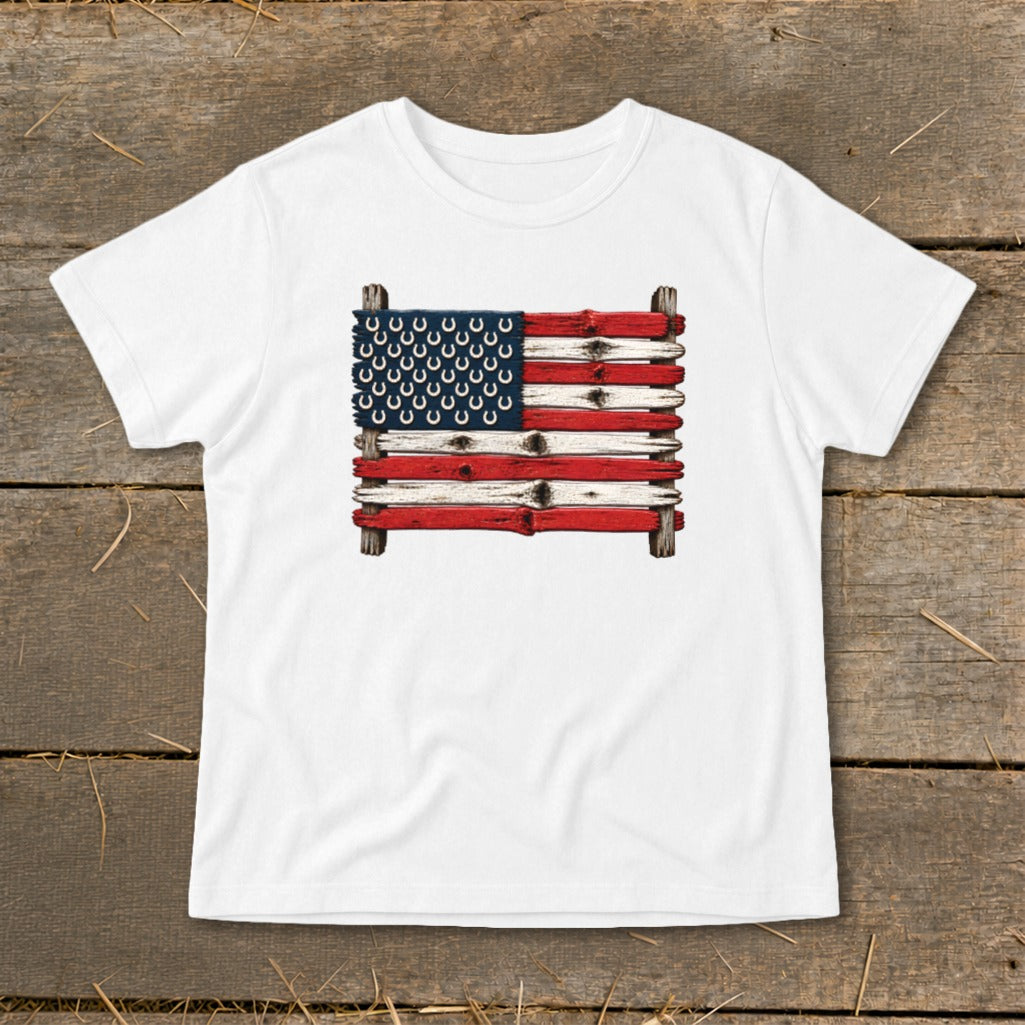 White t-shirt featuring a graphic of the American flag made of painted wooden planks and horseshoes.