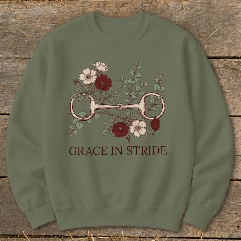 Green sweatshirt with horse bit and floral graphic with text "GRACE IN STRIDE".