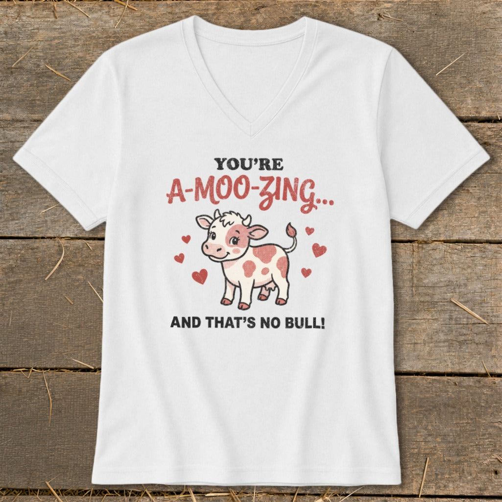White t-shirt with a cartoon cow, red hearts, and text "You're A-moo-zing... And That's No Bull!".