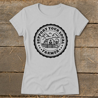 Grey t-shirt with a black circular stamp that says "Support Your Local Farmer".