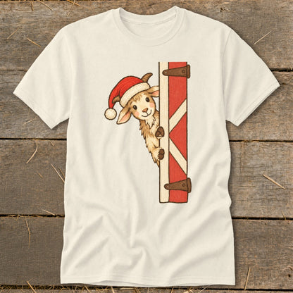 Cream t-shirt featuring a cute llama wearing a Santa hat peeking from behind a red barn door.