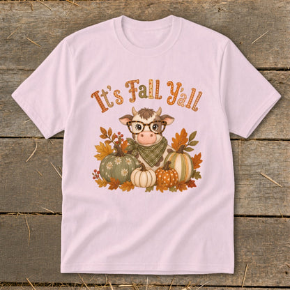 Pink t-shirt with cartoon cow, pumpkins, and "It's Fall Y'all" text.