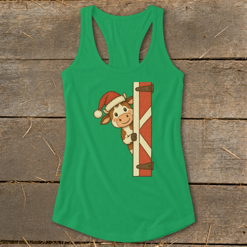 Green tank top with cartoon cow wearing Santa hat peeking from behind barn door.