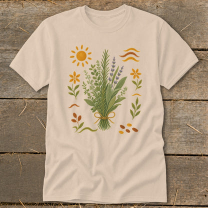 Cream t-shirt with a bouquet of herbs and flowers, a sun, and wavy lines.