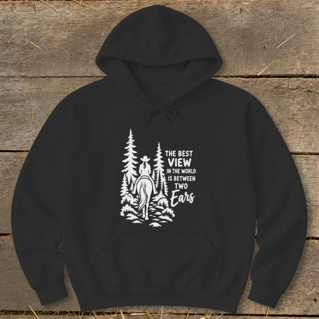 A black hooded sweatshirt with a white graphic of a horseback rider and the text, The Best View in the World is Between Two Ears.
