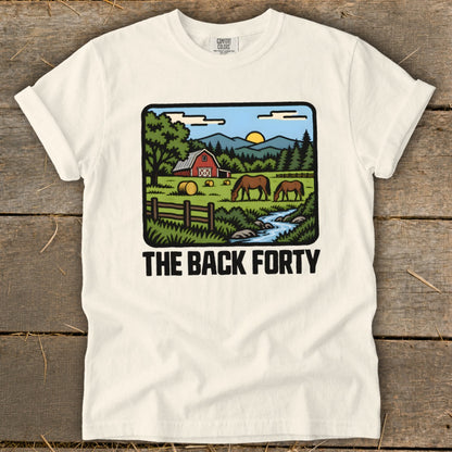 Off-white t-shirt featuring a cartoon illustration of a farm with horses and the text THE BACK FORTY.