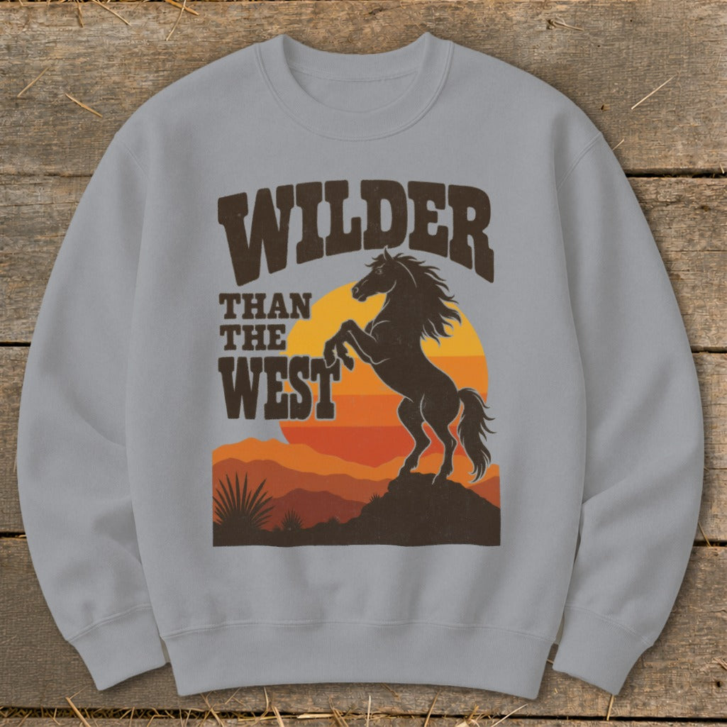 Light gray sweatshirt with a graphic of a rearing horse and "Wilder than the West" text.