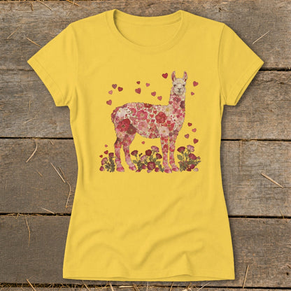 Yellow t-shirt with a floral llama graphic surrounded by hearts.