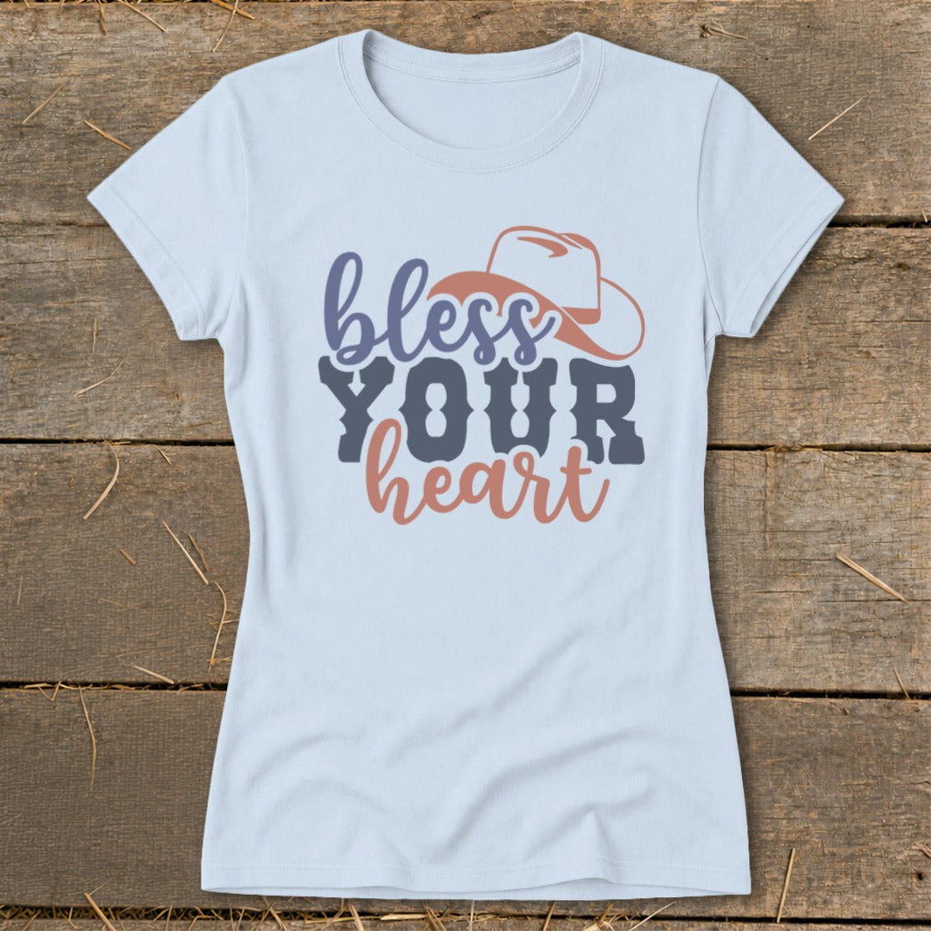 Light blue t-shirt with "bless YOUR heart" text and cowboy hat graphic.
