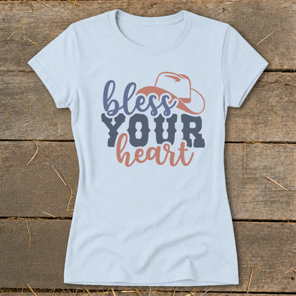 Light blue t-shirt with "bless YOUR heart" text and cowboy hat graphic.