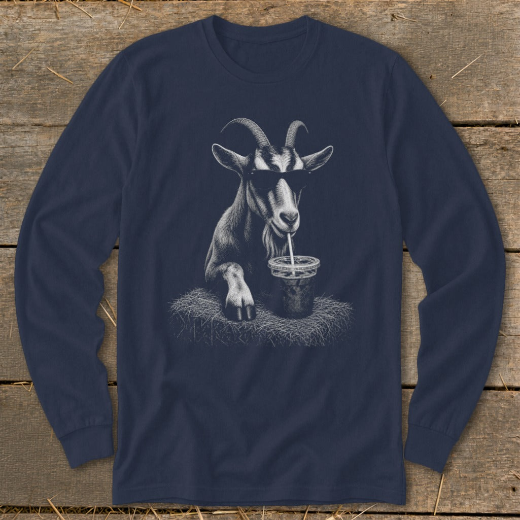 Goat wearing sunglasses drinks from a cup with a straw.
