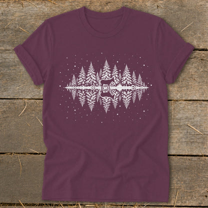 Burgundy t-shirt with white forest and deer silhouette graphic.