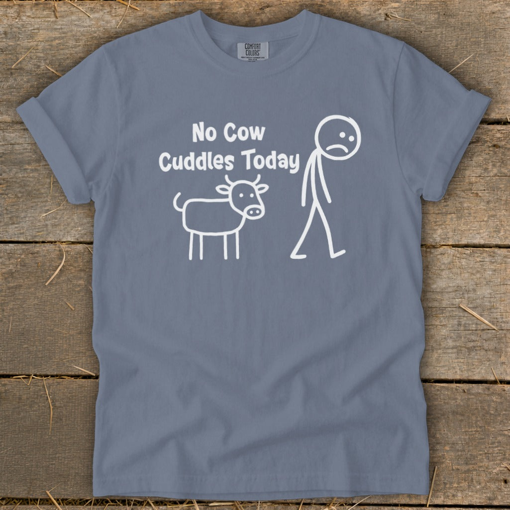 Blue t-shirt with white text and graphics: "No Cow Cuddles Today" and stick figures of a cow and a person.