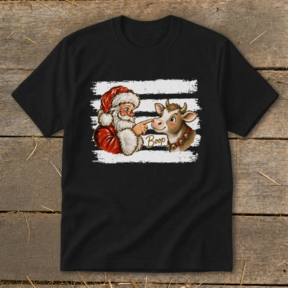 Santa booping a cow with the word "Boop" on a black t-shirt.