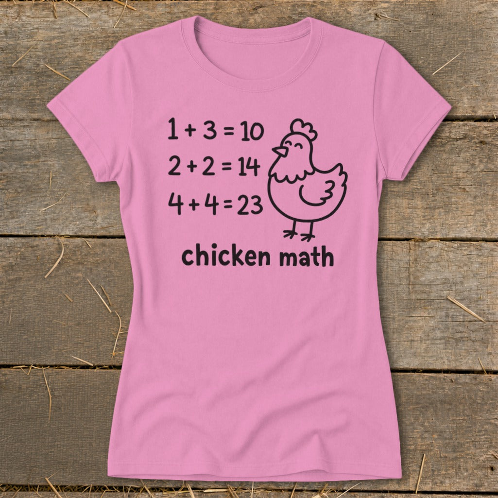 Pink t-shirt with "chicken math" and humorous math equations with a chicken illustration.