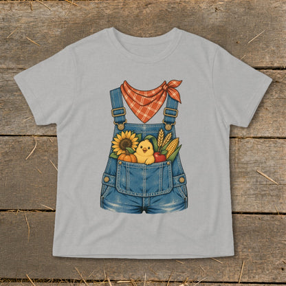 Chick in denim overalls with sunflower, pumpkin, corn, and apple.