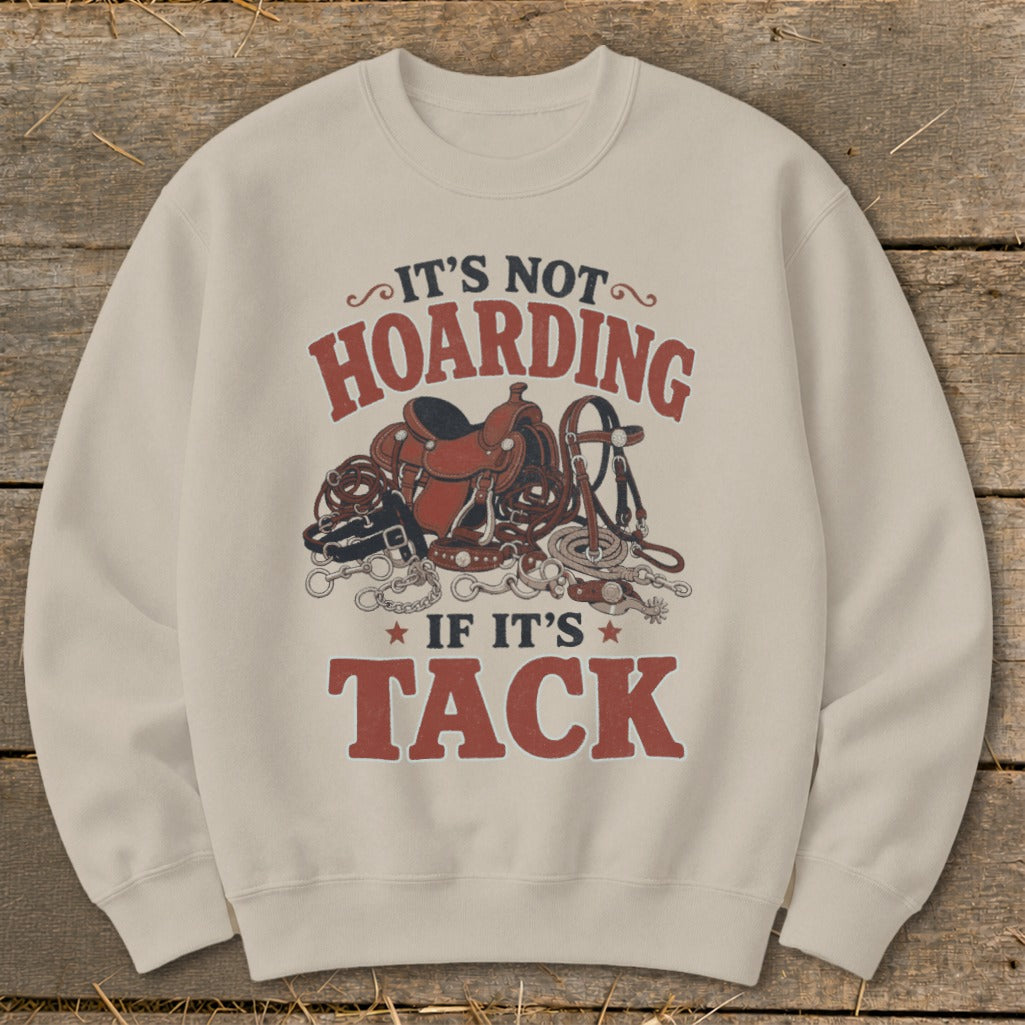 Crewneck sweatshirt with "It's Not Hoarding If It's Tack" text and equestrian gear.