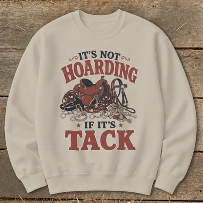 Crewneck sweatshirt with "It's Not Hoarding If It's Tack" text and equestrian gear.