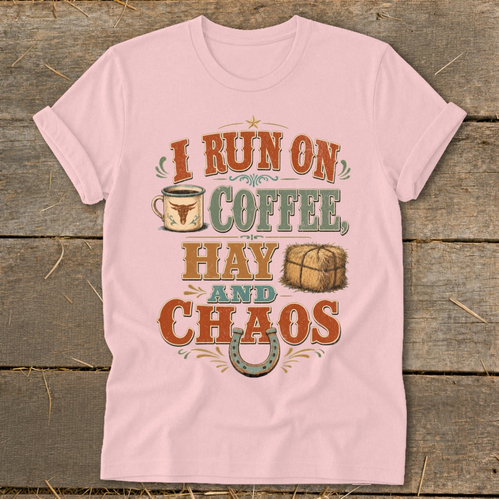 Pink t-shirt with text "I RUN ON COFFEE, HAY AND CHAOS" and graphics.