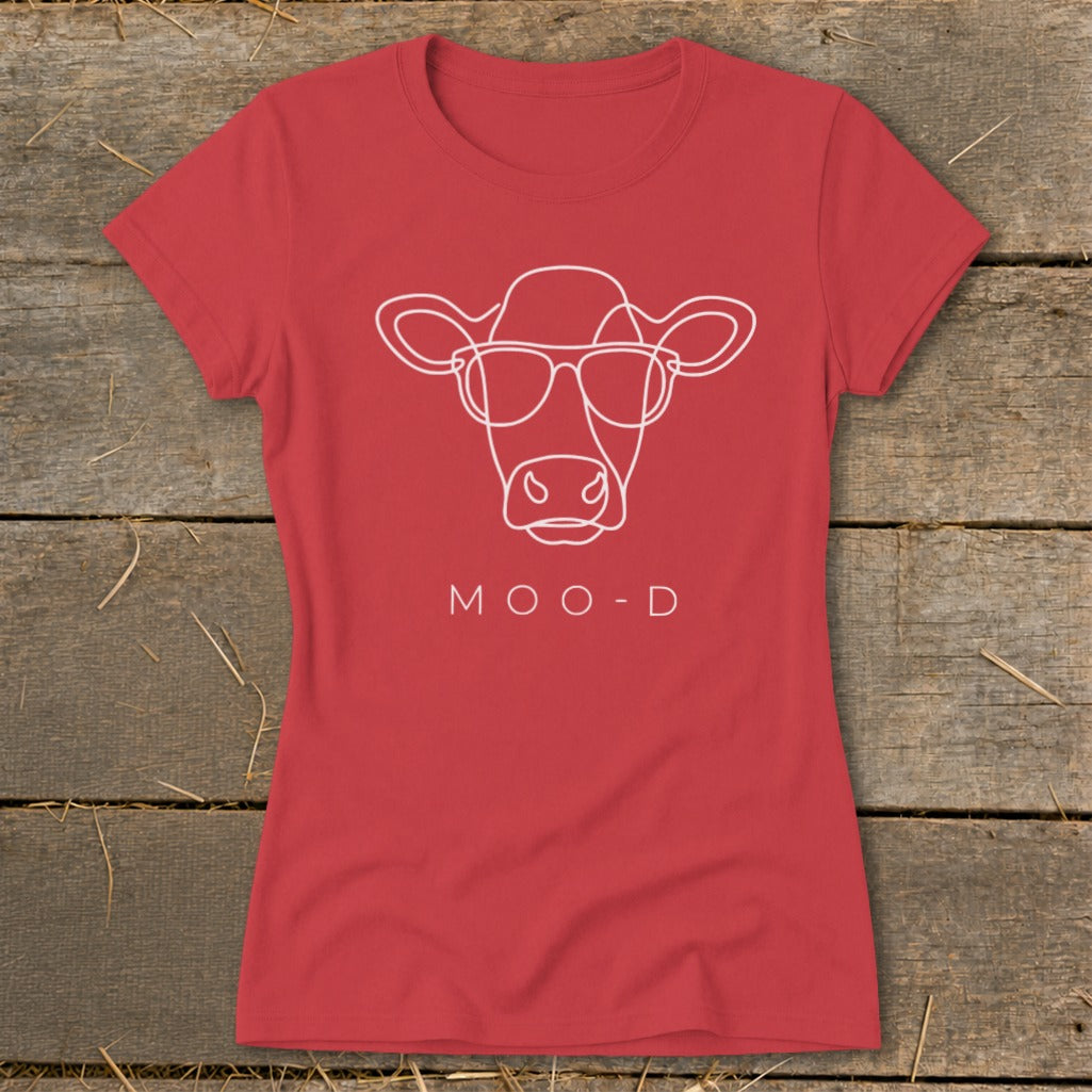Red t-shirt with white outline of a cow wearing sunglasses and the text "MOO-D".