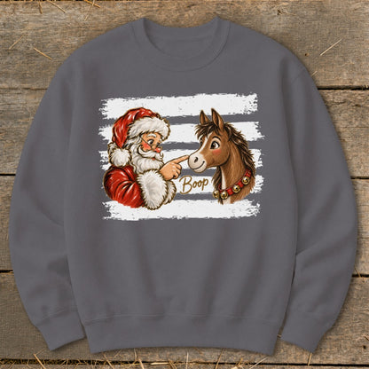 Santa booping a horse on the nose with "Boop" text.