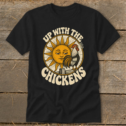 Black t-shirt featuring a graphic of a crowing rooster, a smiling sun, and the text Up With The Chickens.