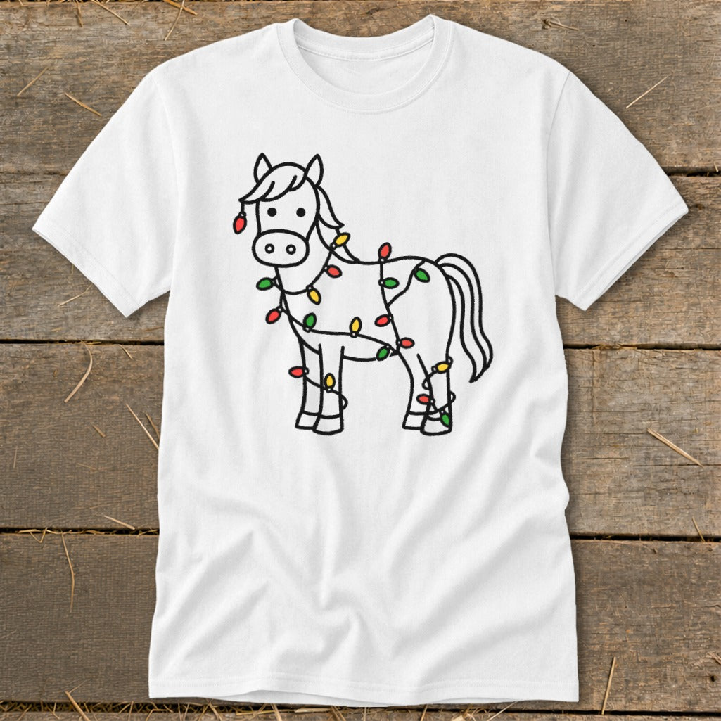 White t-shirt with a black outline drawing of a horse wrapped in colorful Christmas lights.
