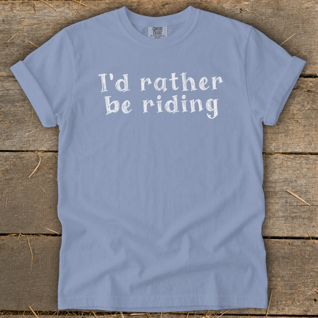 Light blue t-shirt with "I'd rather be riding" in white text.