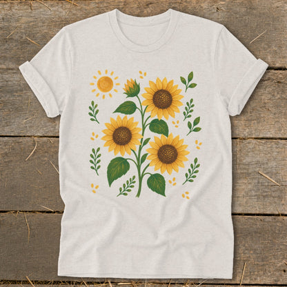 Light beige t-shirt with a sunflower and sun graphic print.