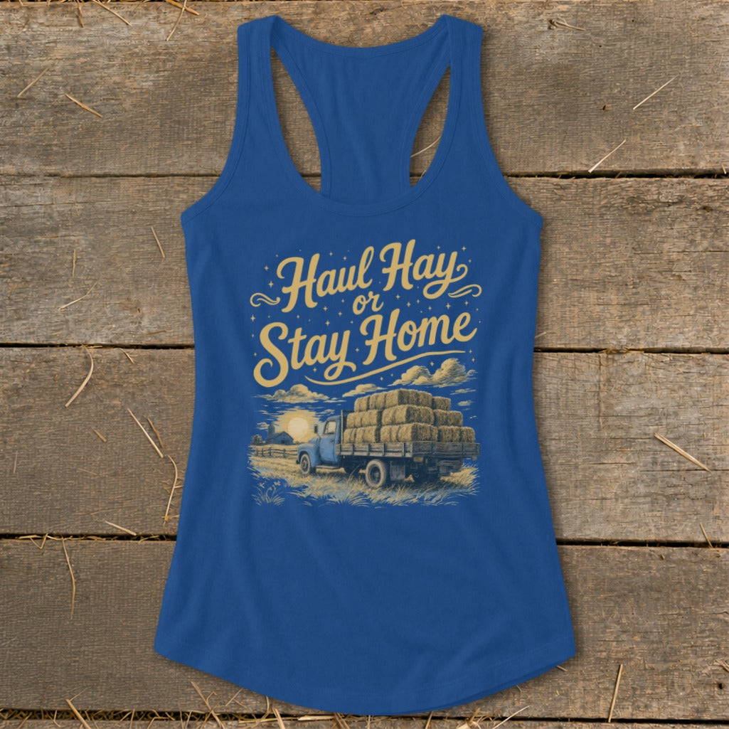 Blue tank top with "Haul Hay or Stay Home" text and truck carrying hay bales.