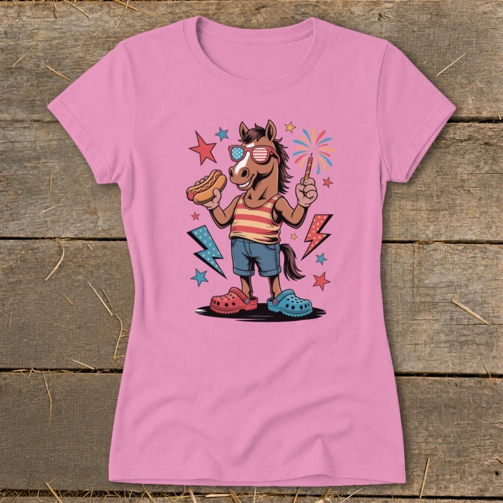 Cartoon horse in sunglasses holding hot dog and sparkler, with fireworks.