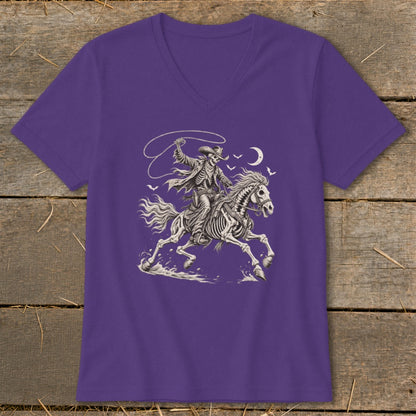 Skeleton cowboy on horseback with lasso and moon graphic on purple t-shirt.