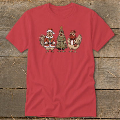 Red t-shirt with a graphic of three chickens dressed for Christmas.