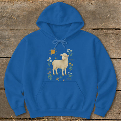 Blue hoodie with a cream sheep, sun, and floral design.