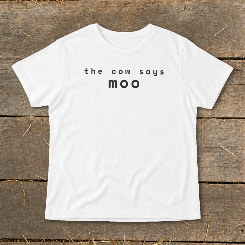White t-shirt with black text "the cow says moo".