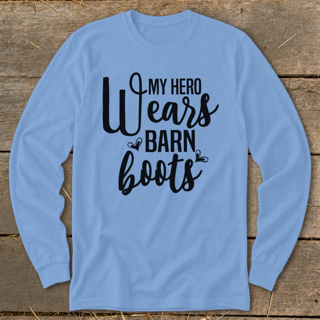 Light blue long sleeve shirt with black text that reads "My Hero Wears Barn Boots".