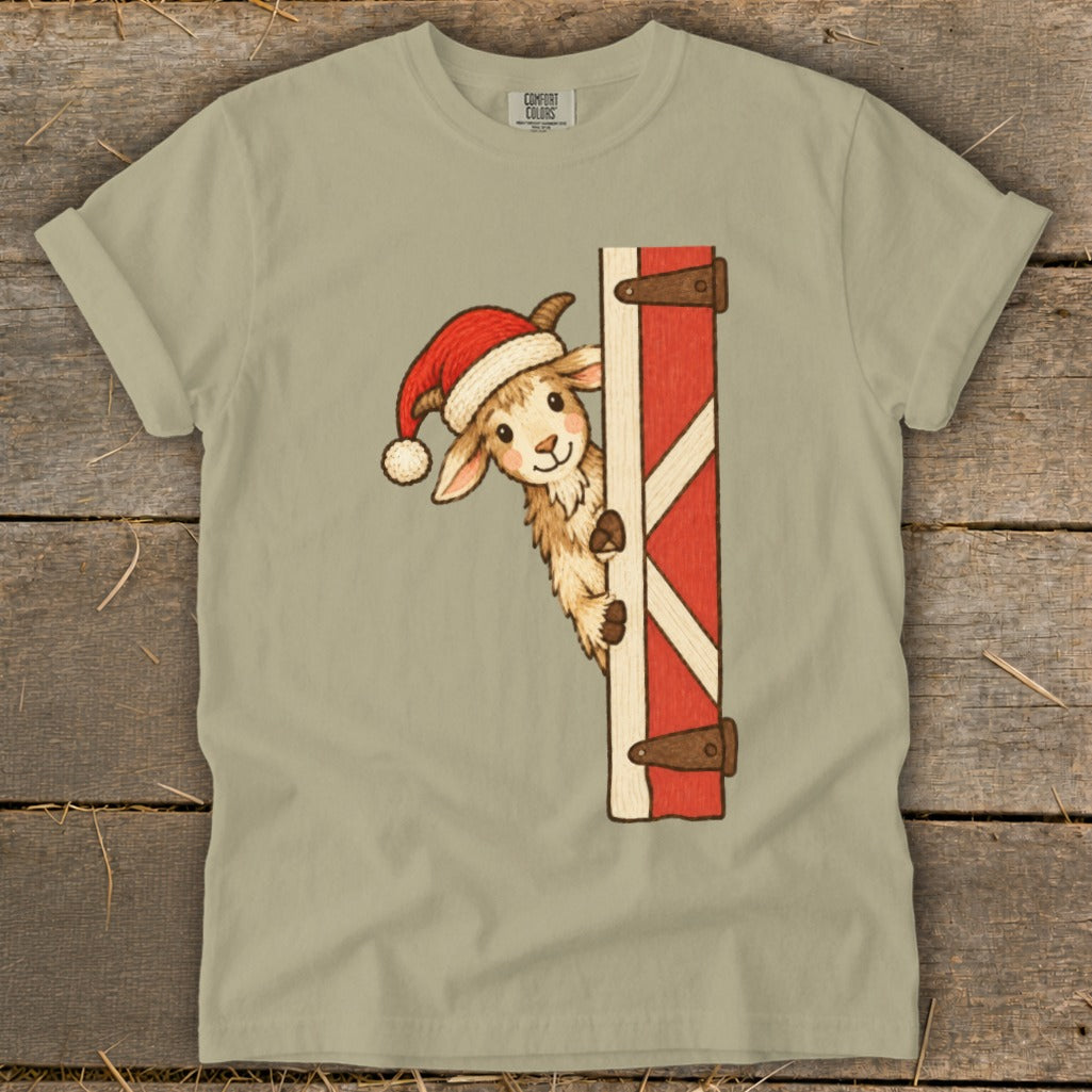 Cartoon llama wearing a Santa hat peeking around a barn door.