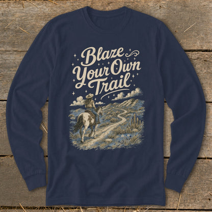 Navy long-sleeve shirt with "Blaze Your Own Trail" and a woman riding a horse through a desert landscape.